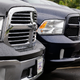 A line of Ram pickups at a different dealerships in 2014. The individual Rams in question are not pictured, but it’s a line of Ram pickups just so you get the idea. Photo Credit: AP